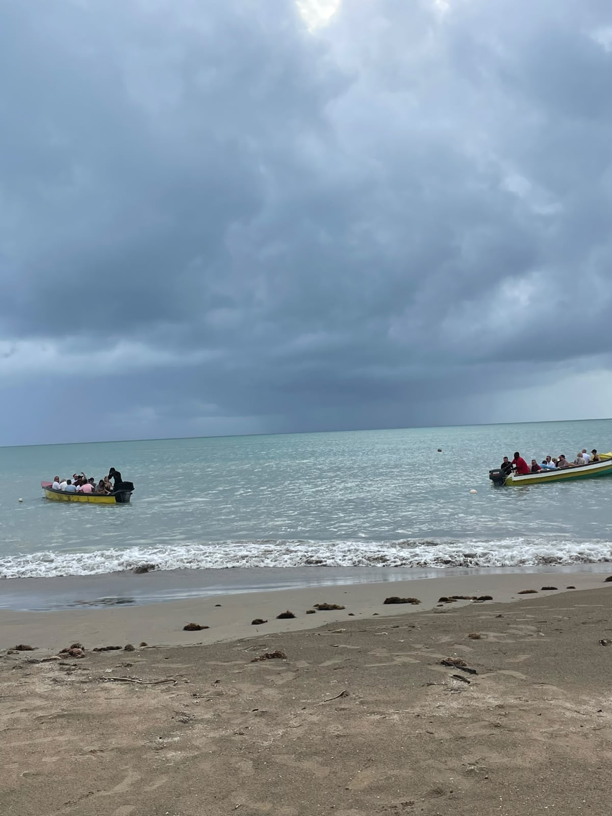 Boats loading passengers near Parottee shore